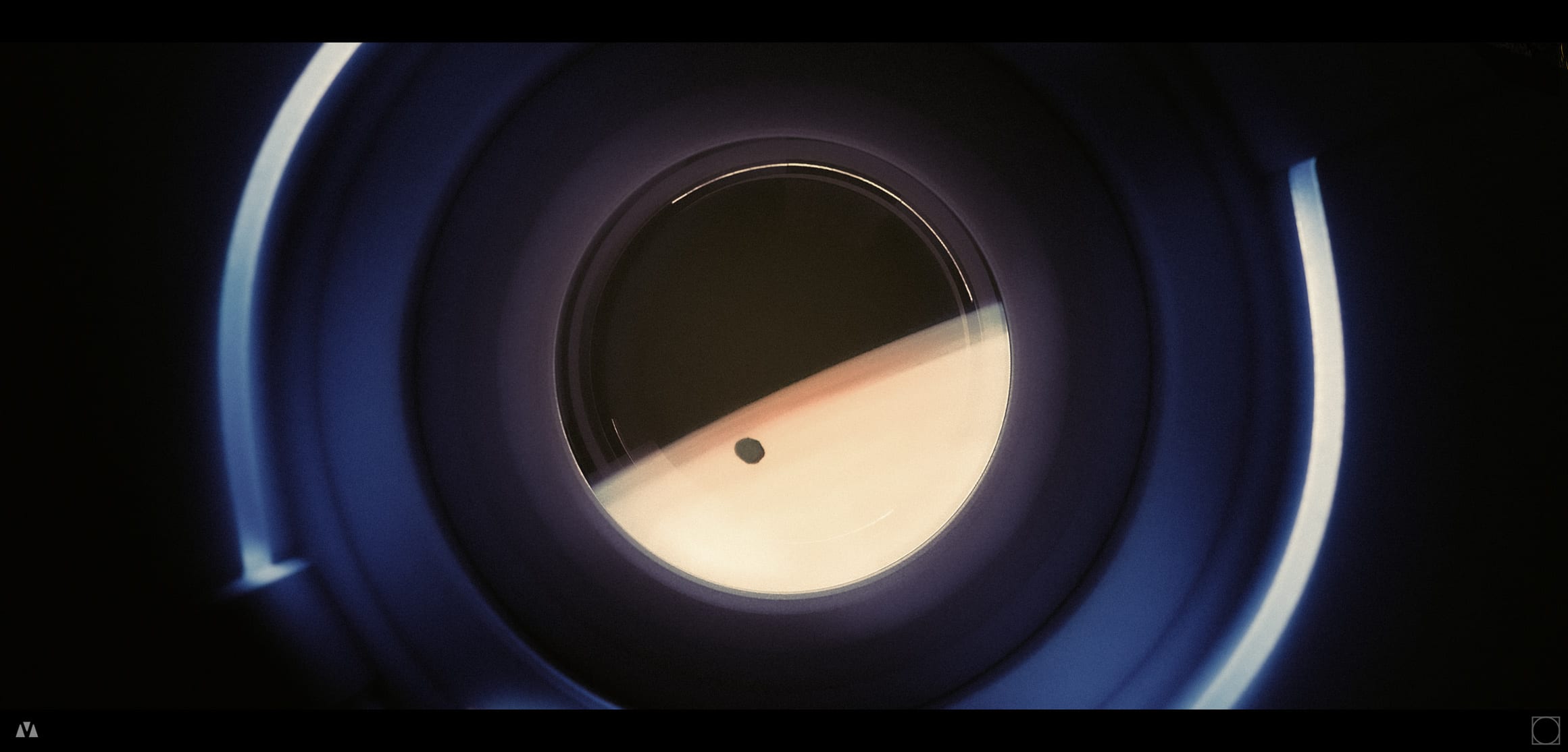 Mars seen through a dark circular spacecraft aperture