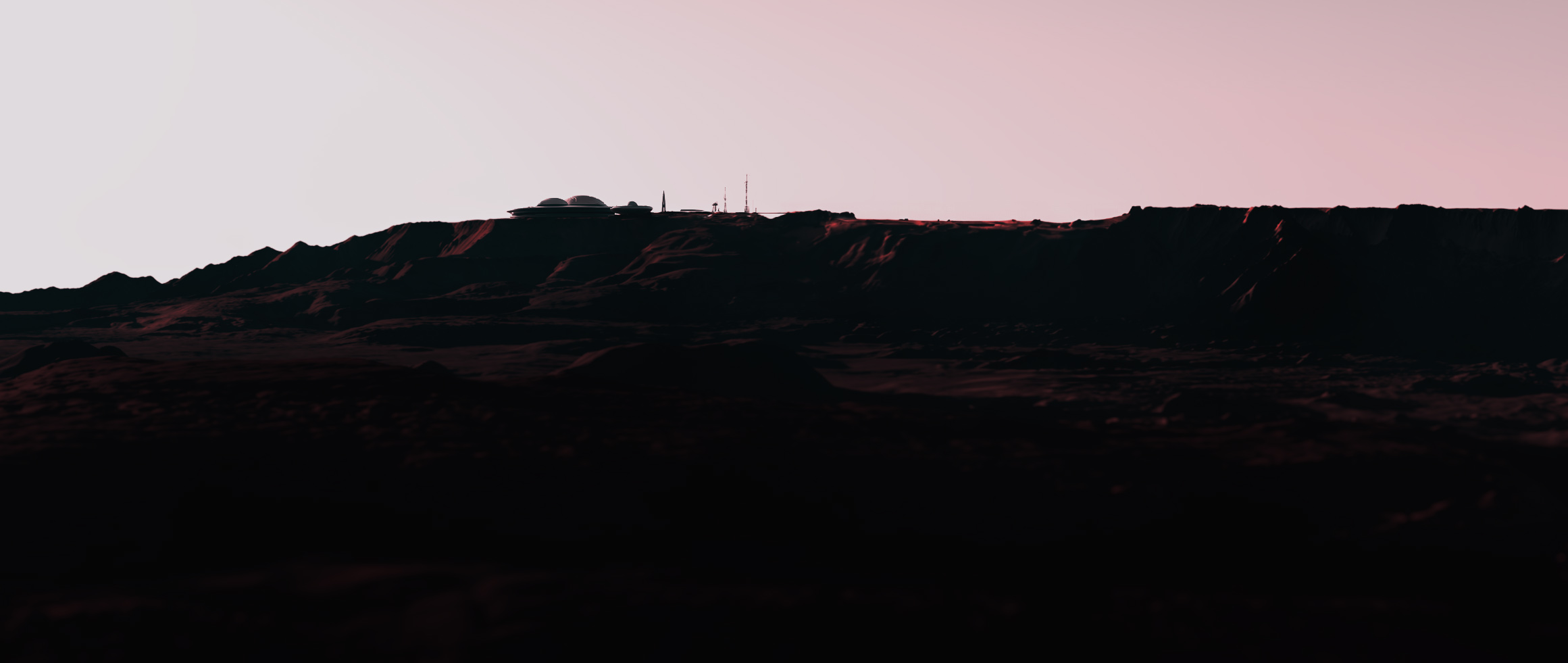 A distant Martian base silhouetted along a dark ridge