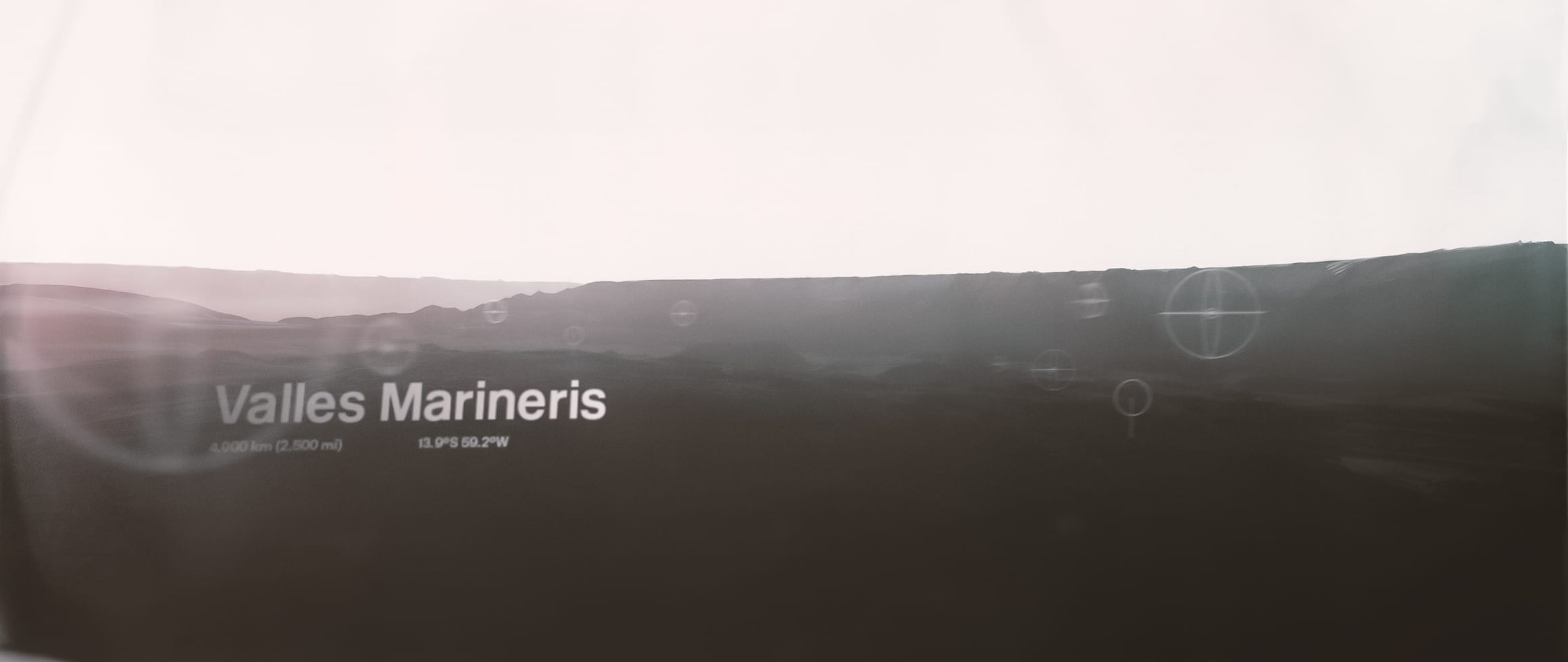 Valles Marineris terrain viewed through a restrained scientific interface
