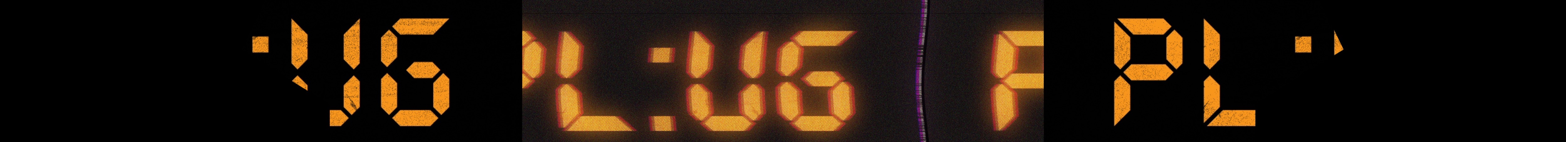 Amber segmented digital typography moving across a black panoramic field